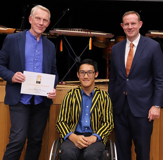 Dominic Case from Climate Change Balmain Rozelle accepts his certificate of recognition from  Mayor Darcy Byrne and Zarni Tun 2019 Young Citizen of the Year and member of the Balmain Parra Rowing Team